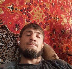 Николай